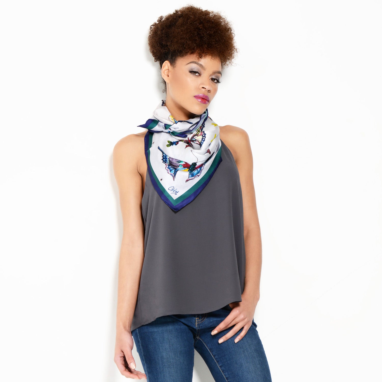 Model wearing Chetna Singh butterfly print silk square scarf.