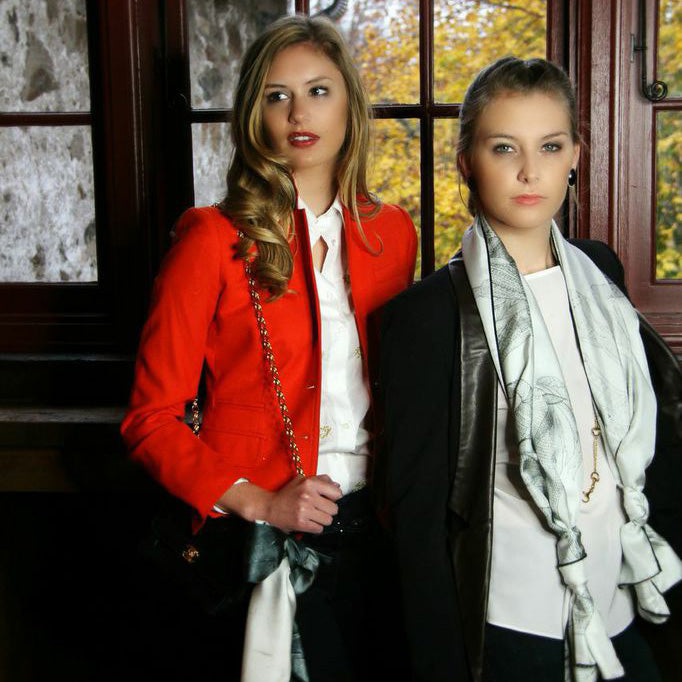 Model wearing Chetna Singh white henna horse print long silk scarf.
