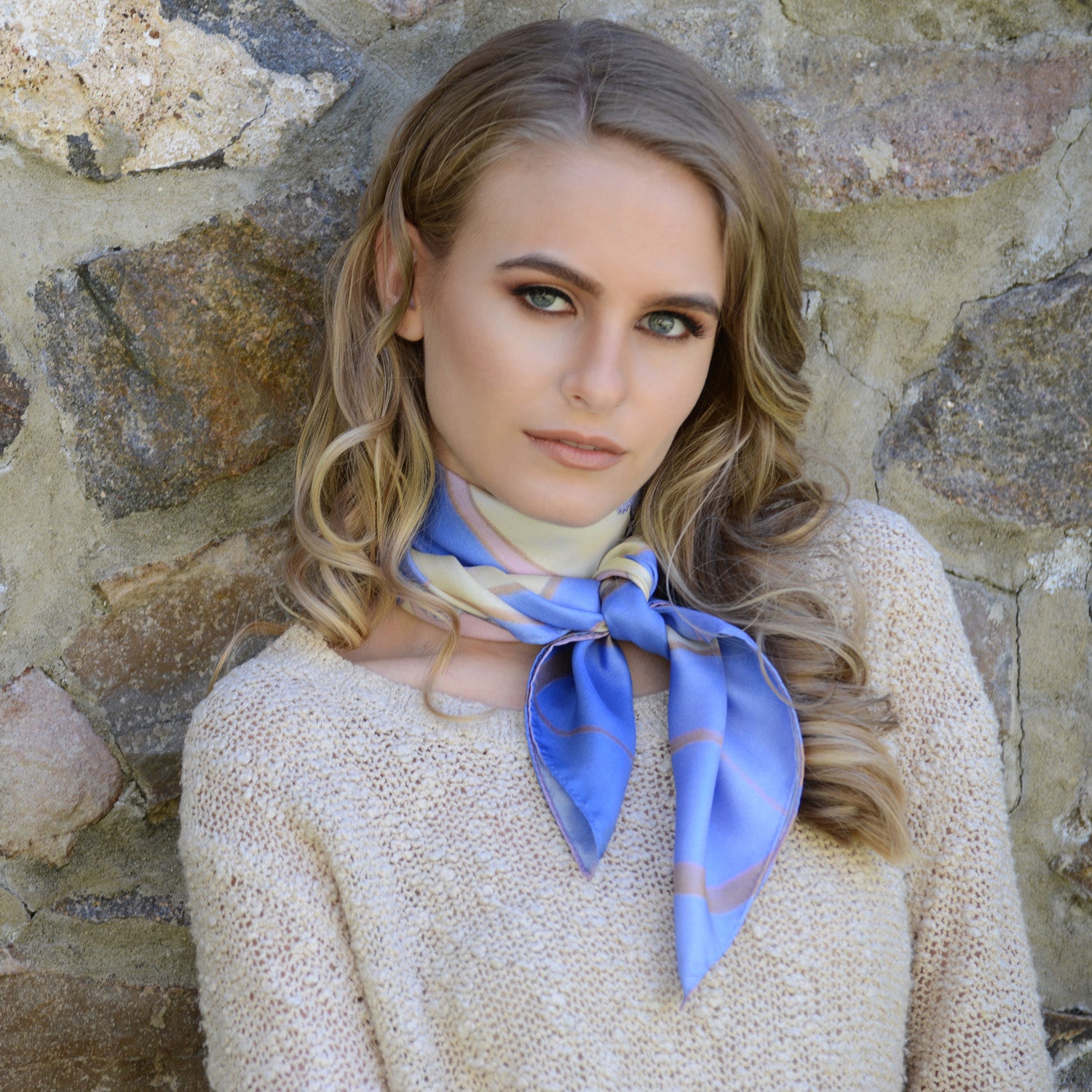 Model wearing Chetna Singh key and lock "Paris" print square silk scarf.