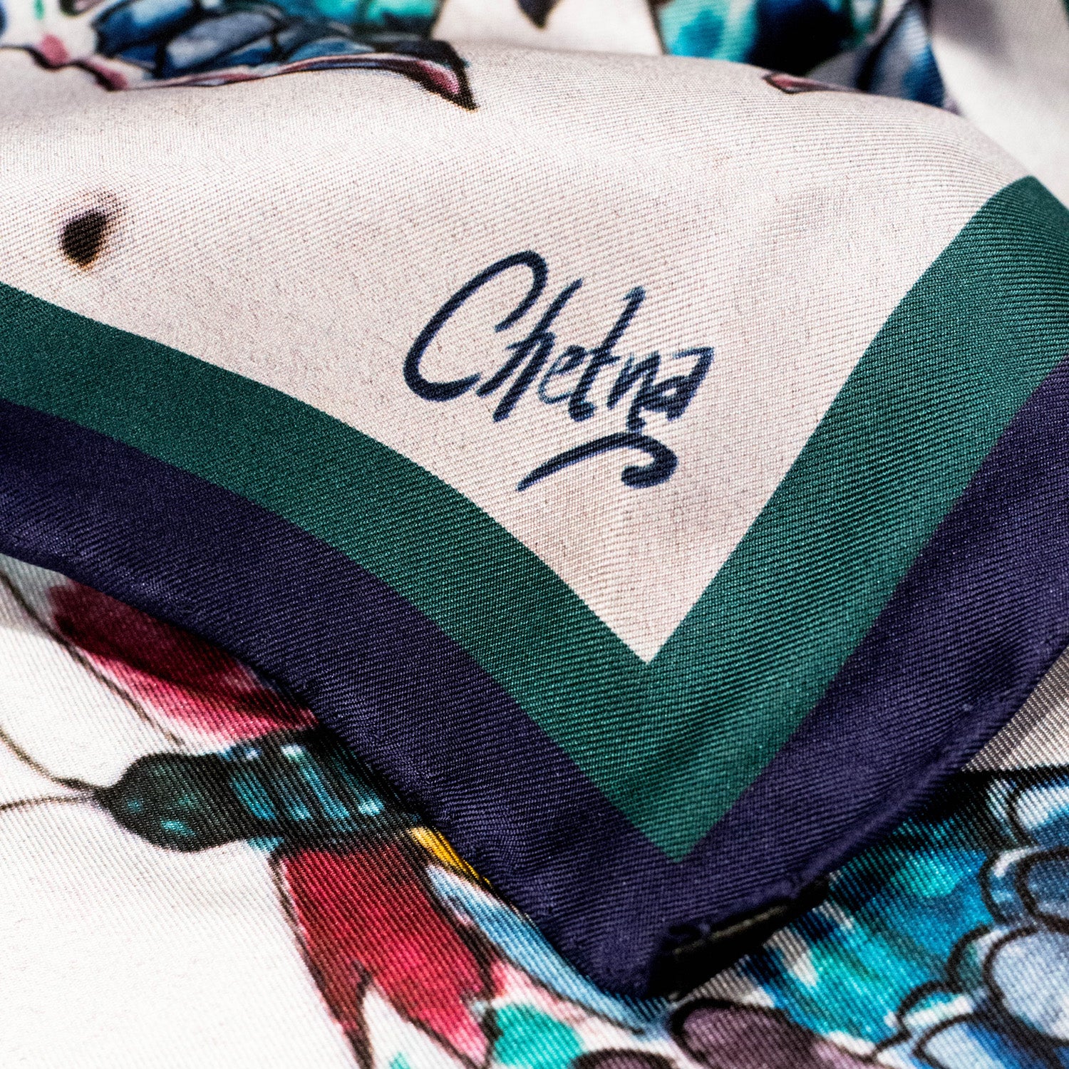 Close-up of Chetna Singh butterfly print silk square scarf.