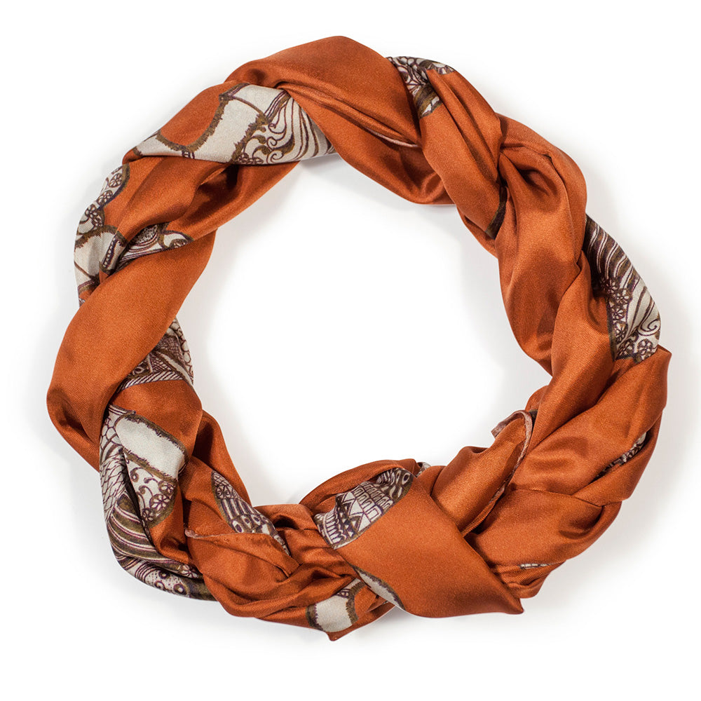 Chetna Singh orange and rust tone elephant print long silk scarf. 