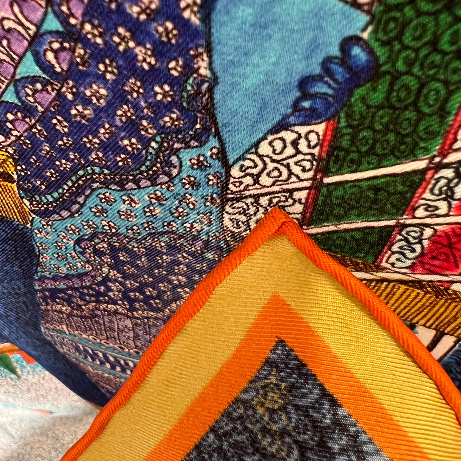 close up detail to show hand rolled edge of Chetna Singh silk square scarf