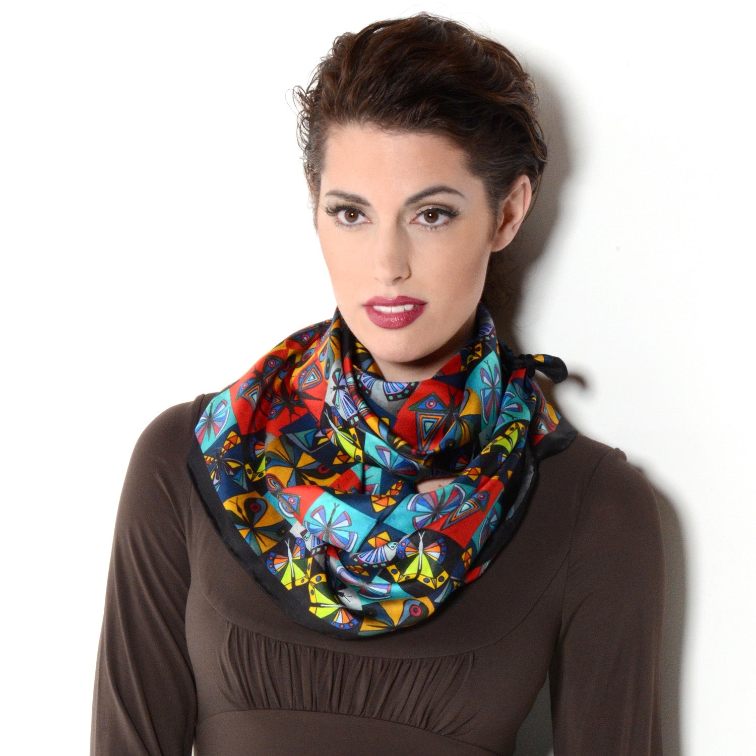 Model wearing Chetna Singh multi-color butterfly print square silk scarf. 