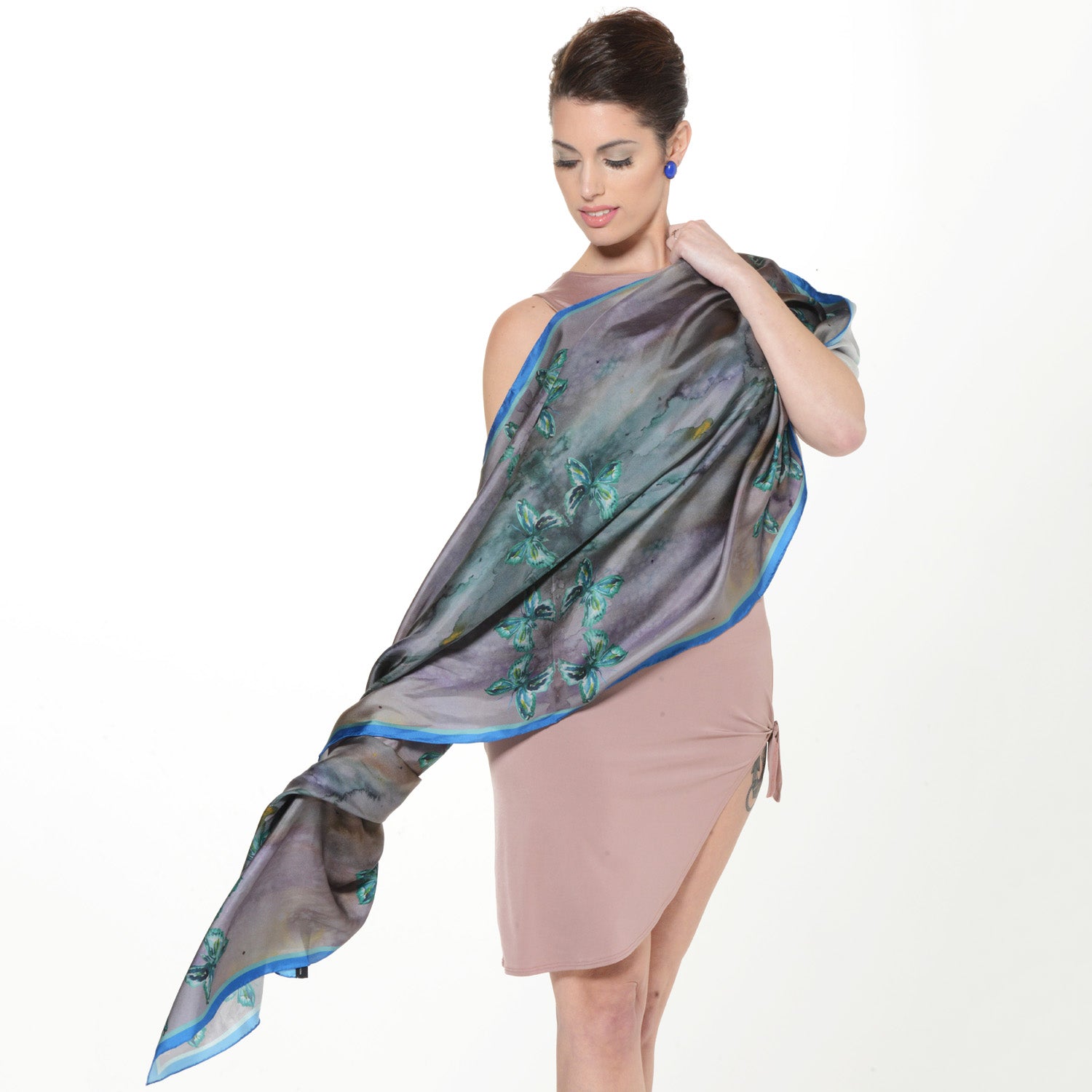Model wearing Chetna Singh jewel tone butterfly print long silk scarf. 