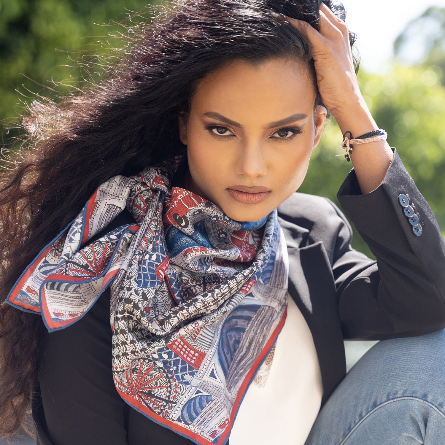 London silk scarf on model from chetnasingh folklore collection. white, red and blue scarf